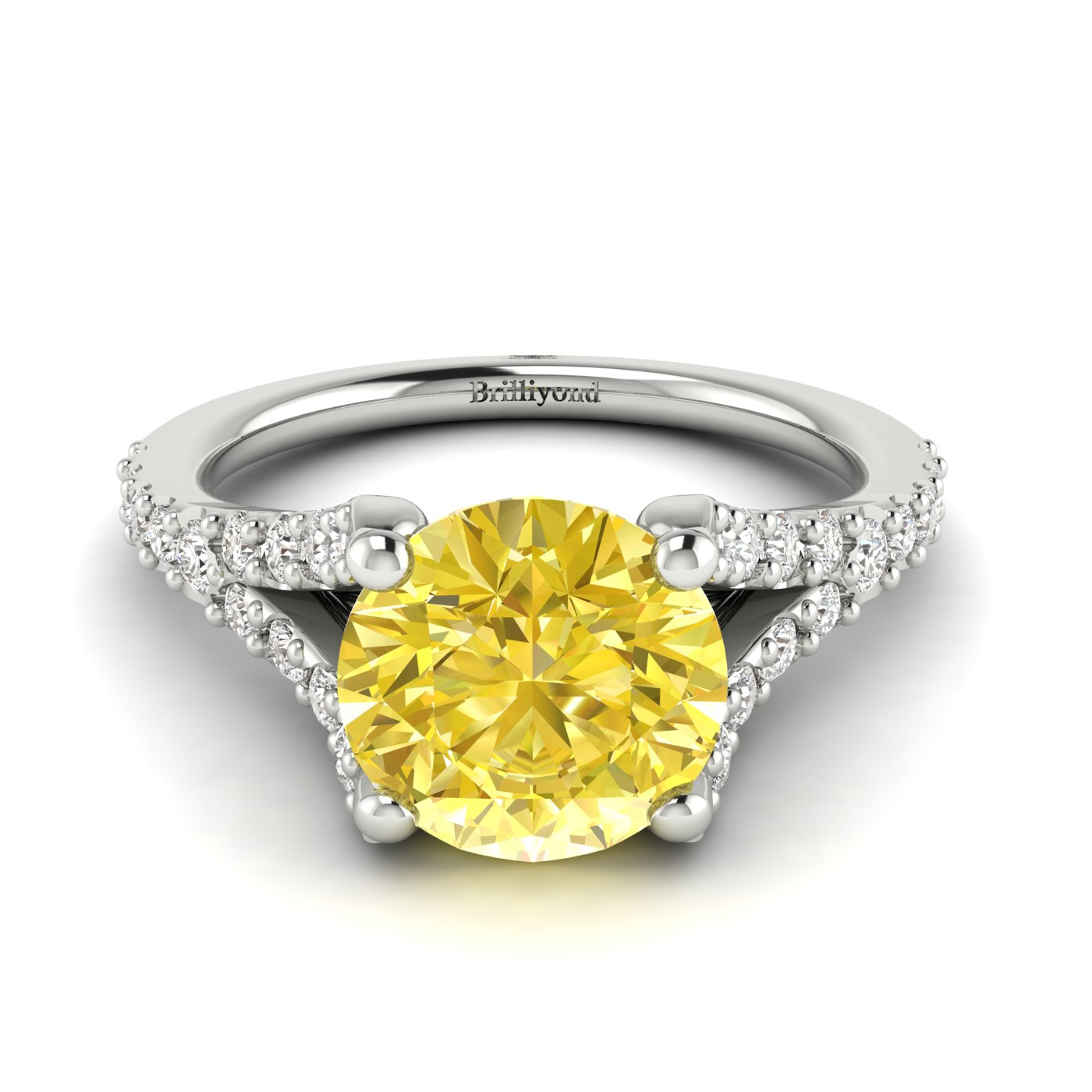 A sapphire engagement ring in 18k white gold with a pavé split shank setting.