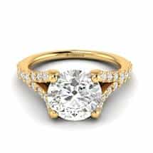 Shimmering 26 white created diamond accent stones in a mesmerising pavé split shank setting.