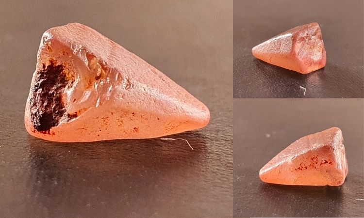 Padparadscha sapphire rough gemstone in salmon colour